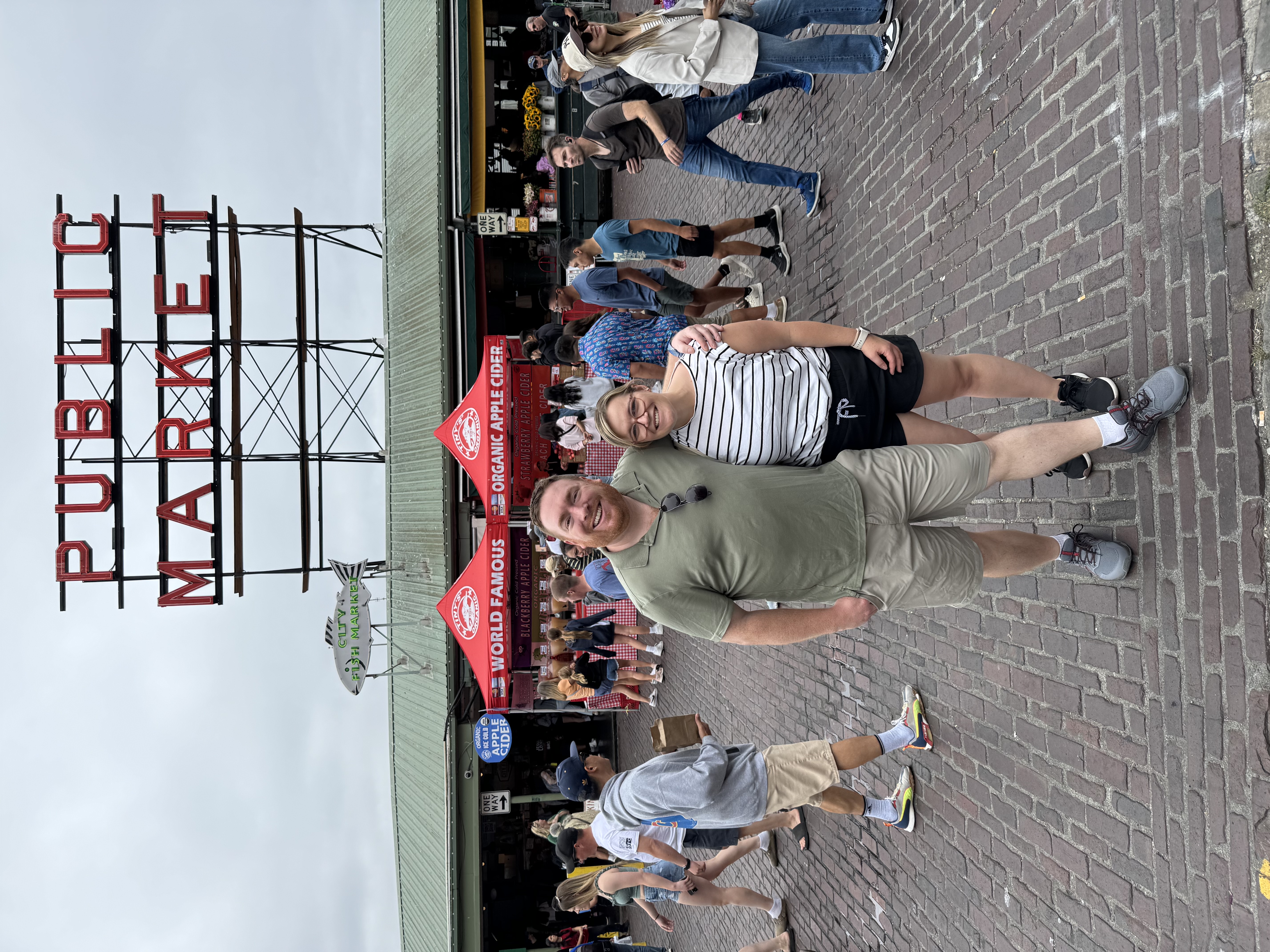 Chris and Brittany standing outside the Public Market